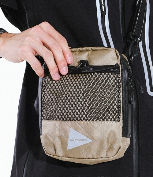 AND WANDER]Ecopak Sholder Pouch - Beige (5744975195-040